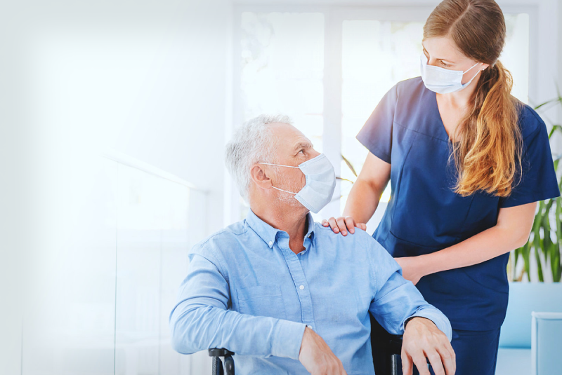 Healthcare Expert with an Elderly Man