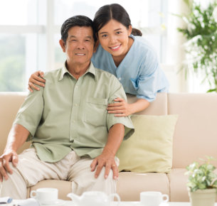Happy Caregiver with a Man